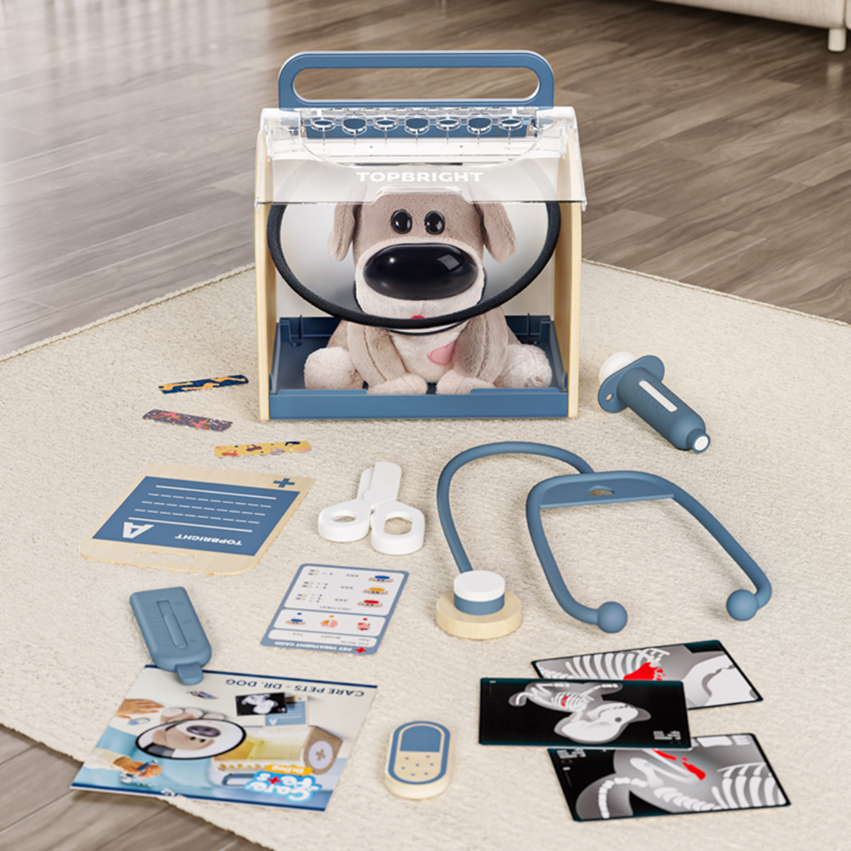 Set vétérinaire enfant avec chien peluche interactif et ses accessoires étalés sur une table